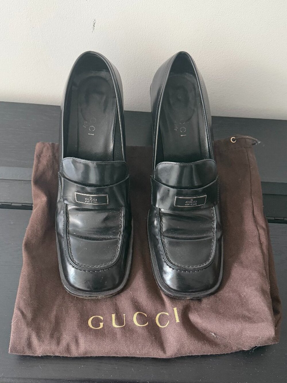Gucci Black Heeled Loafers w/ Silver Logo Plate | Size 39